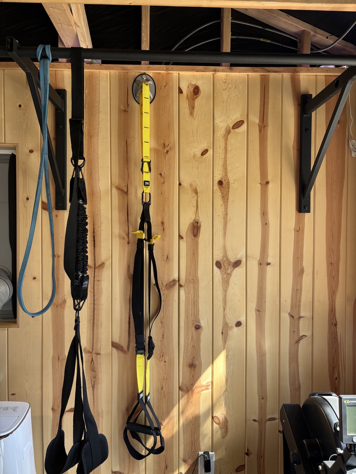 TRX XMount mounted on the gym wall