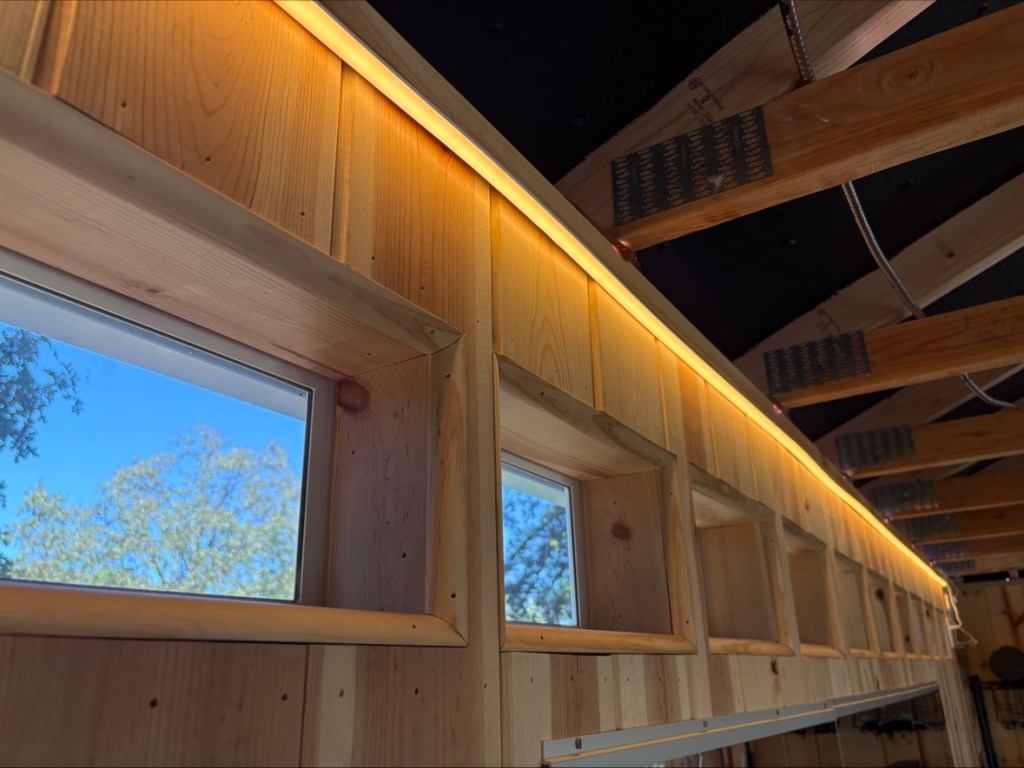 Govee COB LED strip light glowing along the gym ceiling