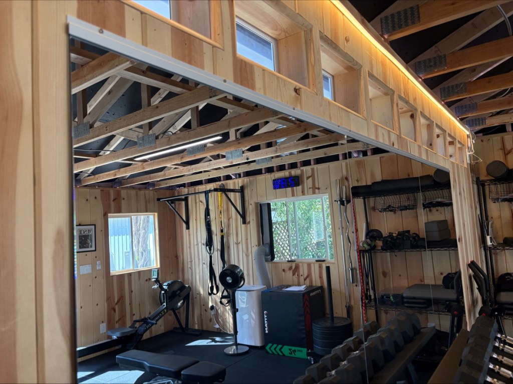 Latitude Run full-length wall mirrors mounted in the gym