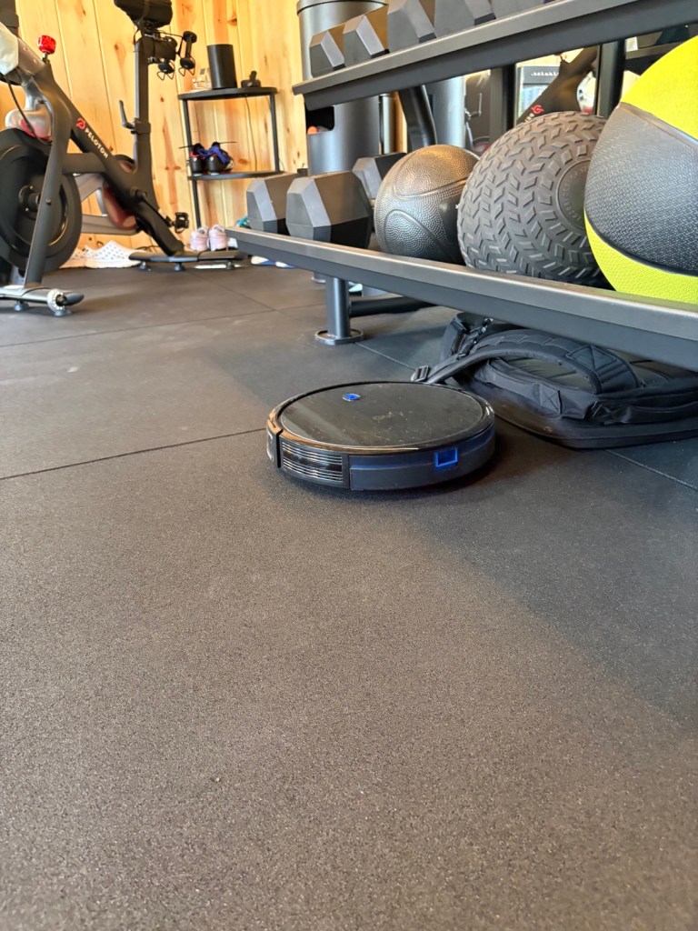 eufy 11S MAX robot vacuum on the gym floor