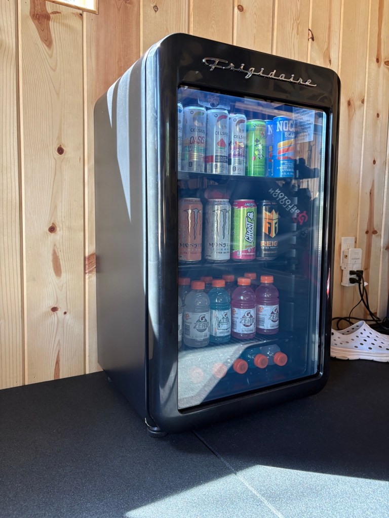 Stocked Frigidaire beverage cooler